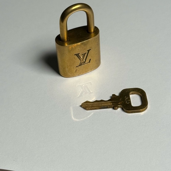 Louis Vuitton Gold over brass padlock with Key. #323. - Picture 1 of 5